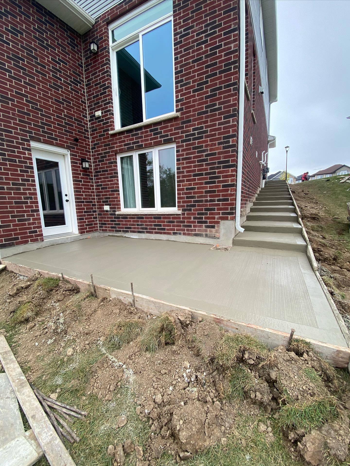 Concrete walkway and steps installation by Moussa Concrete in London Ontario